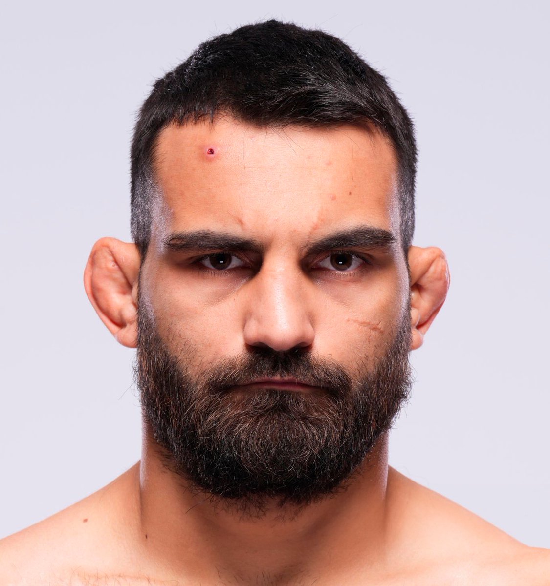 Combattant MMA avec lésion cutanée, infection tatami